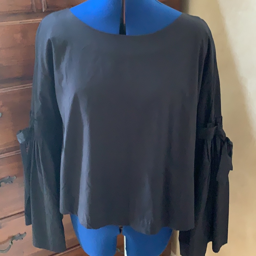 NWT Free People back buttoned bow blouse.